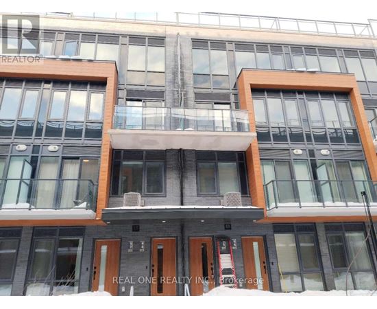 A building with the words REAL ONE REALTY INC. BROKERAGE on the front.