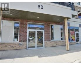 The image shows the front of a building with the number 50 on it.