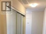 A glass door with a REALTOR sign above it.