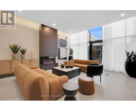 A living room with a long sofa and a coffee table.