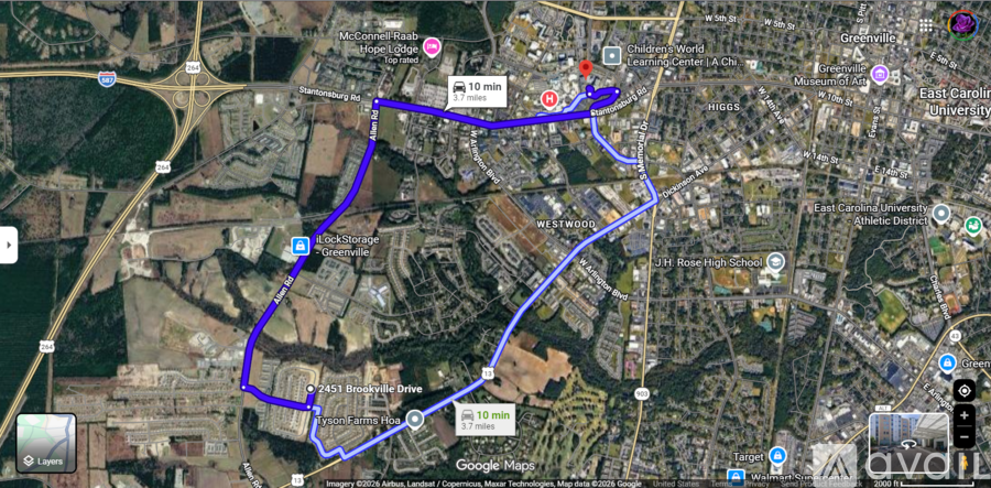 A map with a blue line indicating a route through a city.