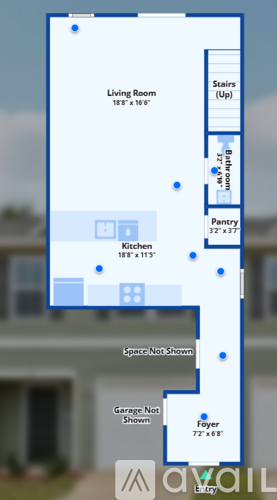 A blueprint of a house with a living room, kitchen, pantry, and foyer.