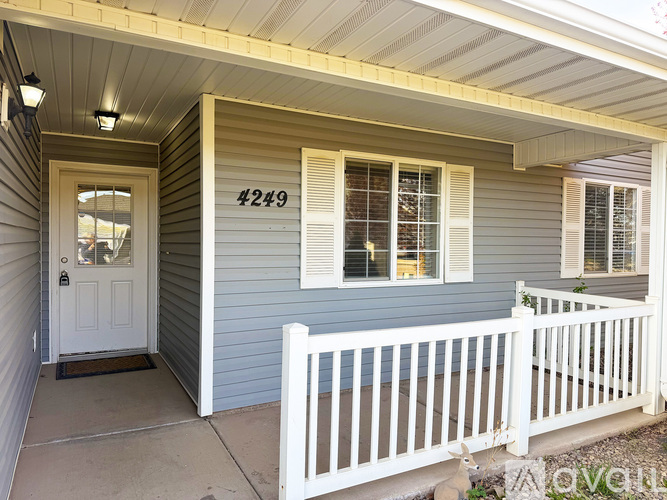 A house with the number 4249 on the front wall.