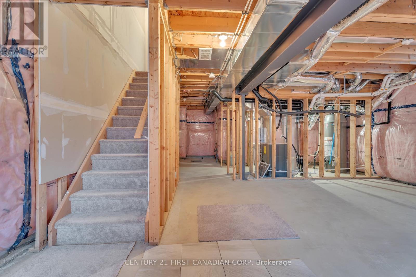 A view of a staircase in a building under construction.