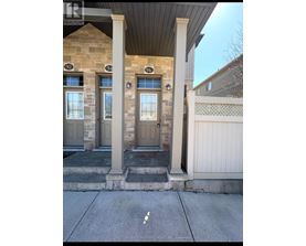 The image shows the front of a house with the number 94 on the door.