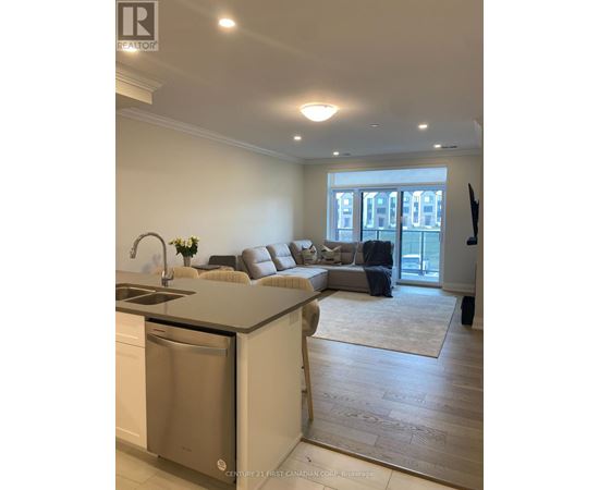 A modern kitchen with a dishwasher and a sink.