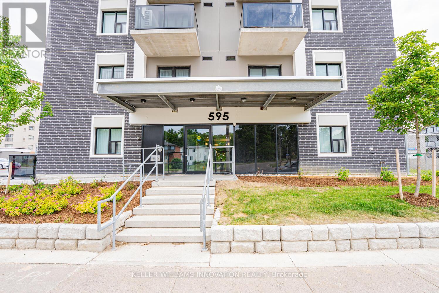 The front of apartment building number 595 is shown.