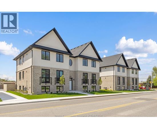 A row of houses with the REALTOR® logo on the bottom left.