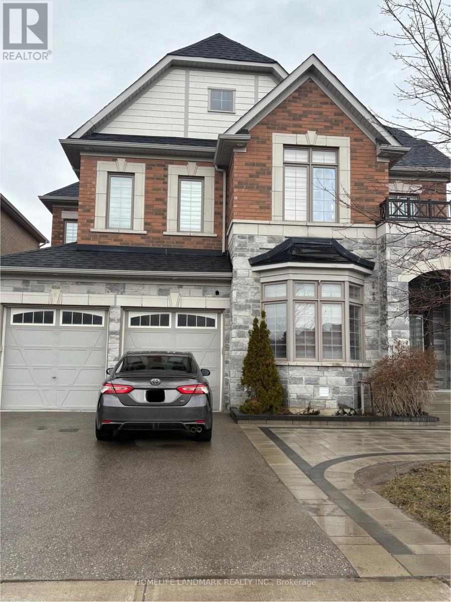 A house with a car parked in front of it.