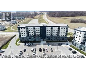 A large building with the words "Windsor-Essex County Association of REALTORS" on it.