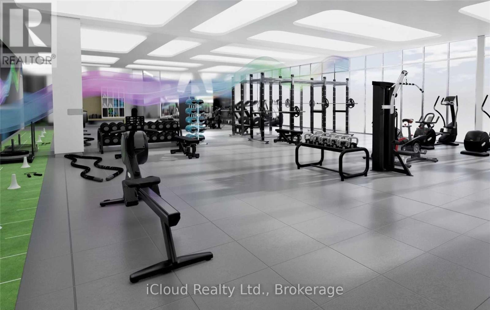 A gym with a variety of equipment including treadmills, weights, and exercise machines.