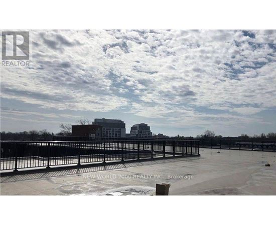 A real estate company is advertising a property with a large open space and a building in the background.