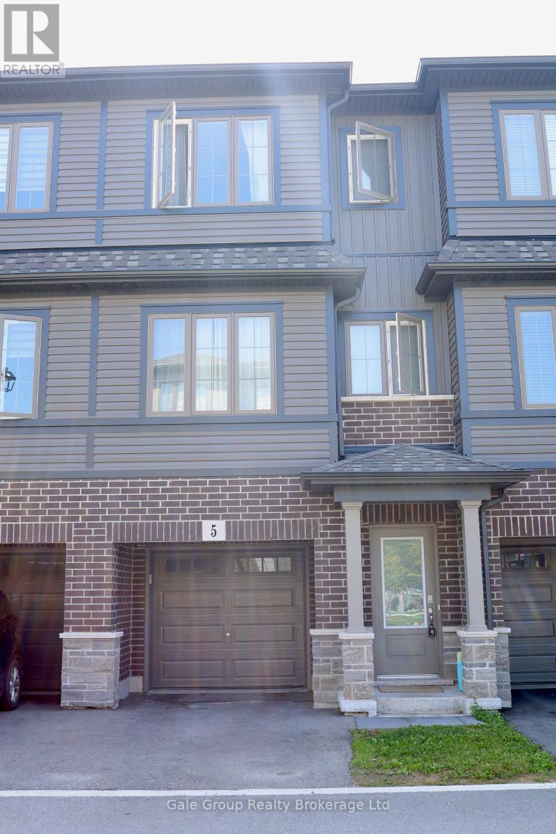 A grey building with the number 5 on it.
