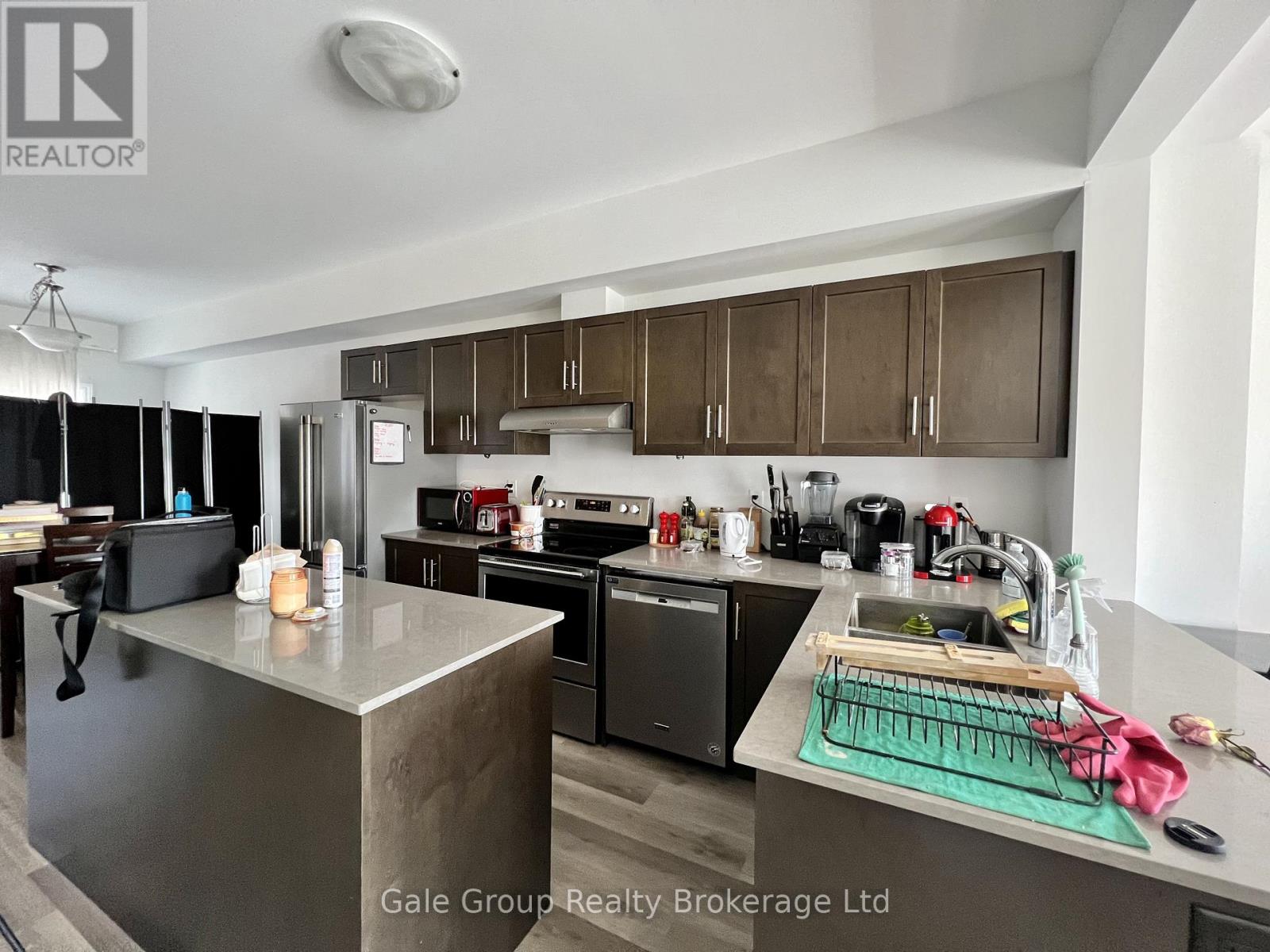 A modern kitchen with a large island in the middle.