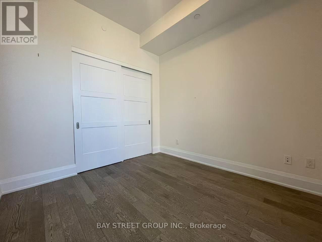 A floor plan for a realtor listing a master bedroom suite and a living/dining room suite.