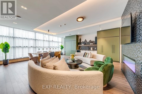 A living room with a large couch and a coffee table.