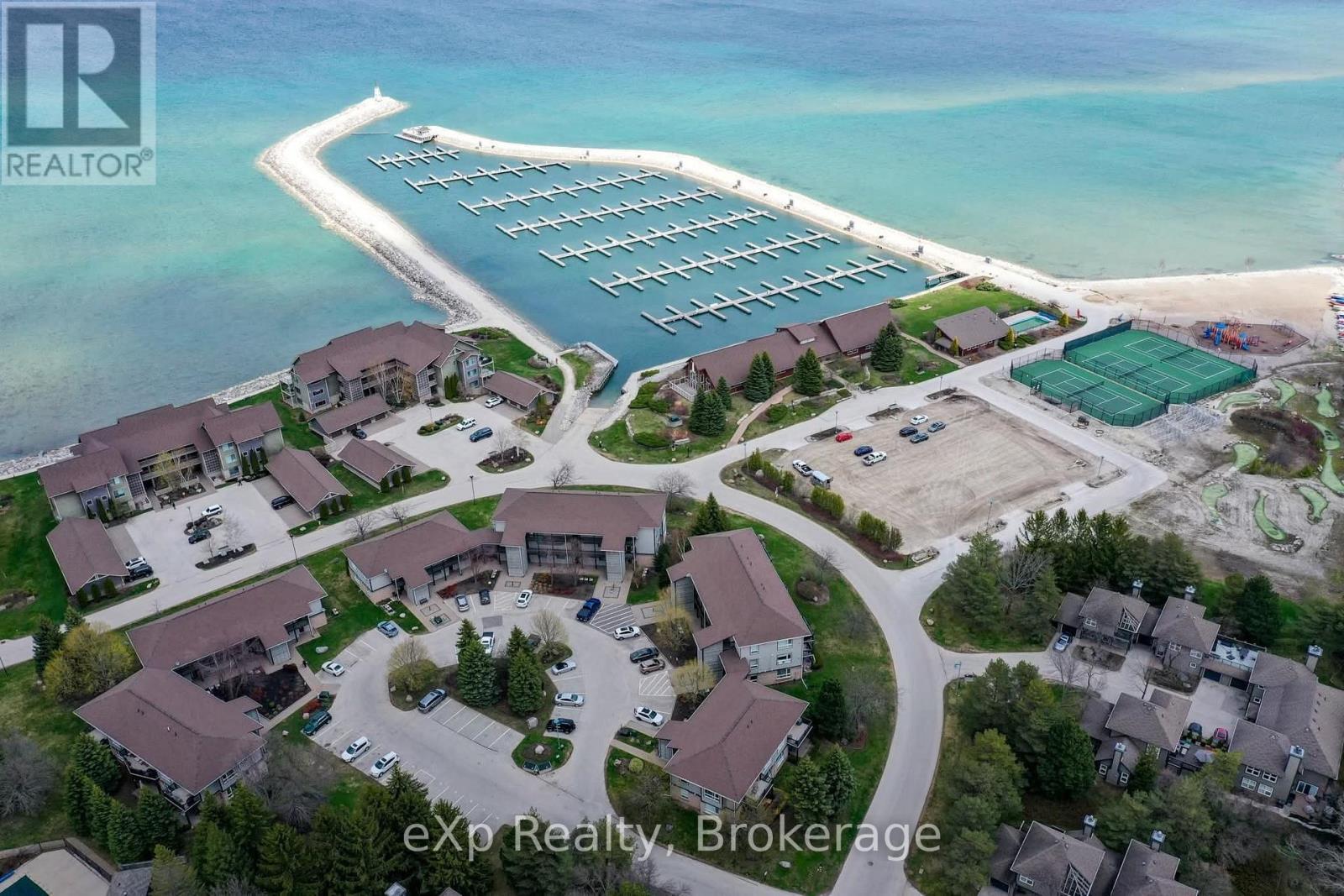 A bird's eye view of a residential area with a marina.