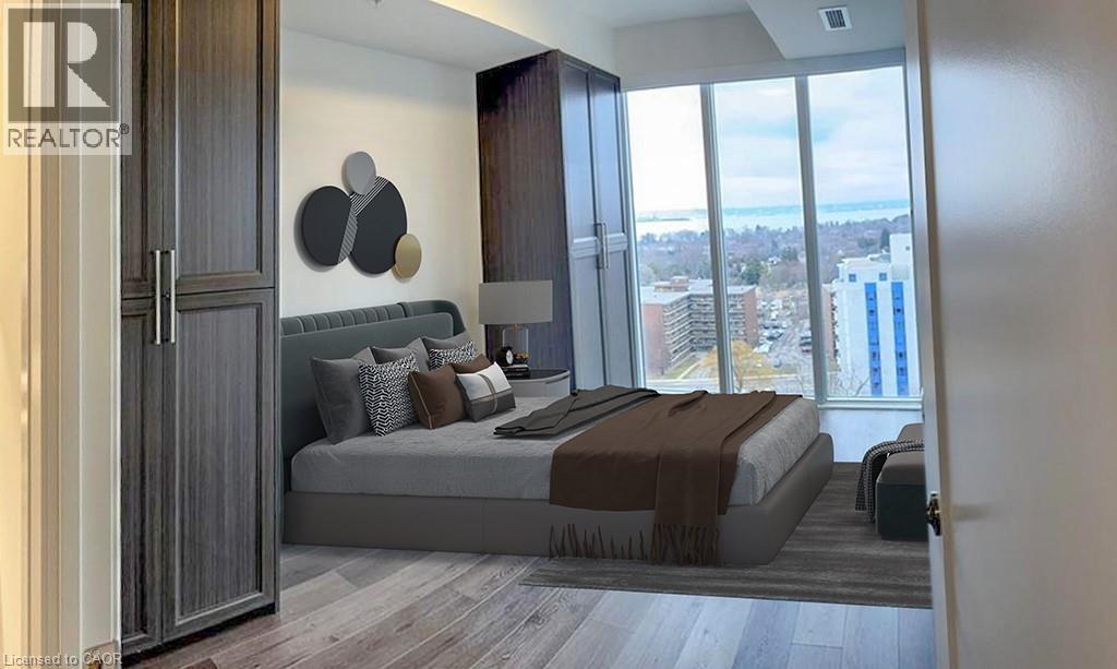 A bedroom with a large bed and a view of the city.