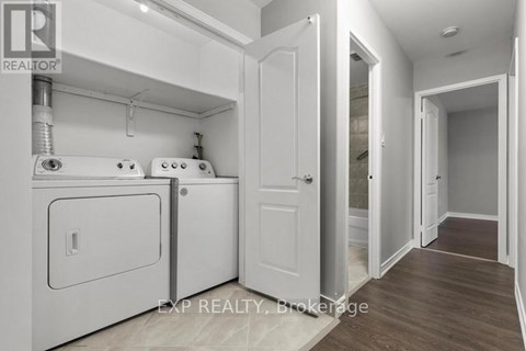 A laundry room with a washer and dryer.