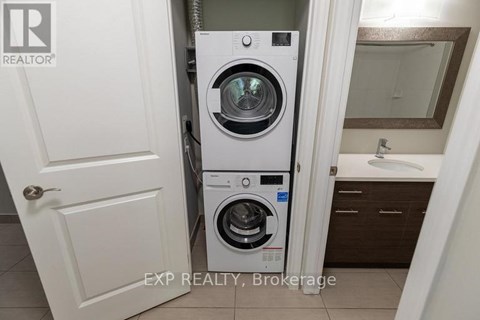A white door with a Realty logo on it.