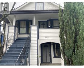 A house with the number 5032 on the front.