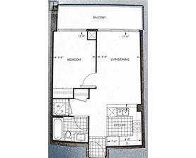 A floor plan of a small apartment with a bedroom, living/dining area, and kitchen.