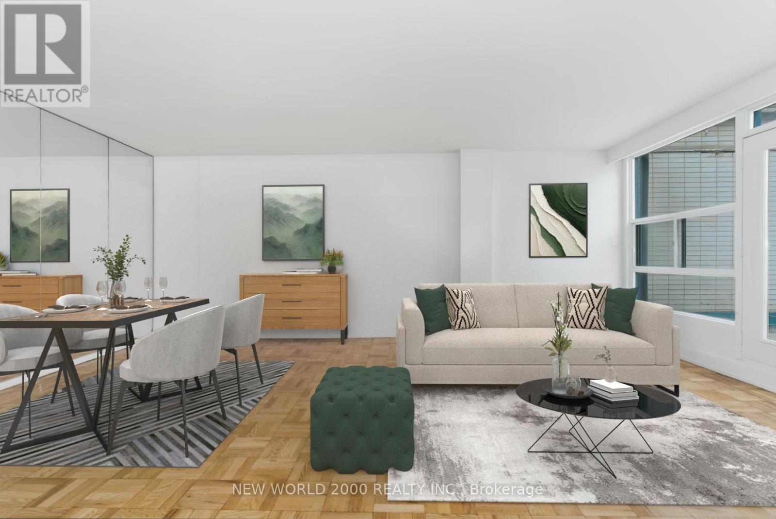 A living room with a couch, chair, and coffee table.
