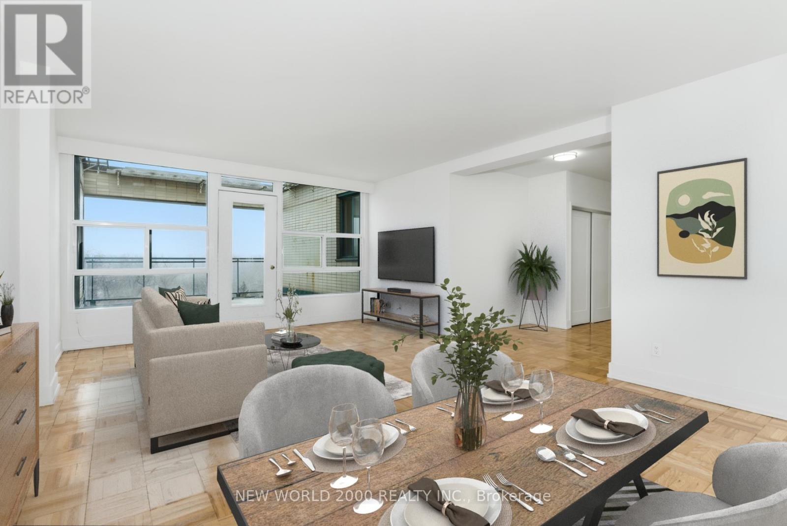 A modern dining room with a wooden table set for two.
