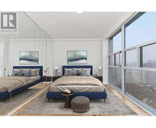 A bedroom with two beds and a large window.