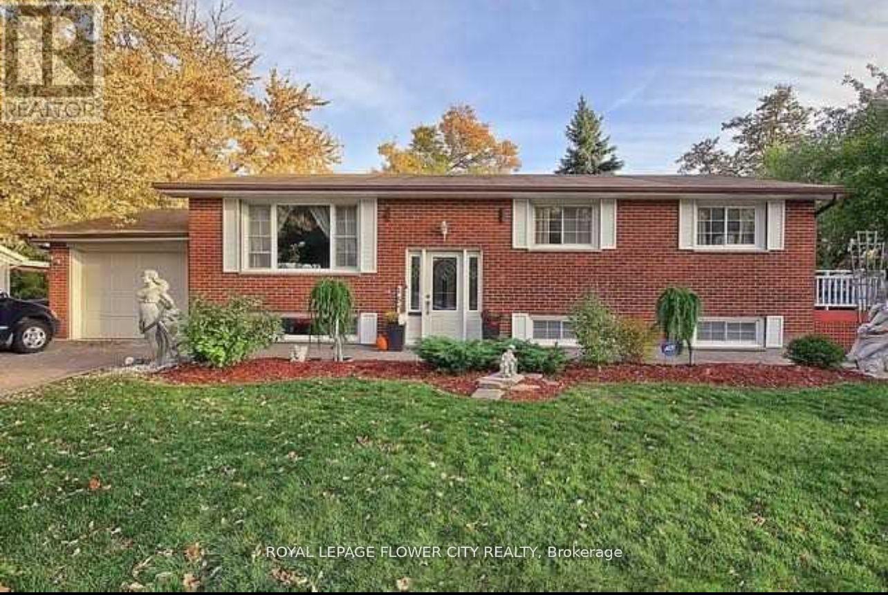 A house with a lawn in front of it.
