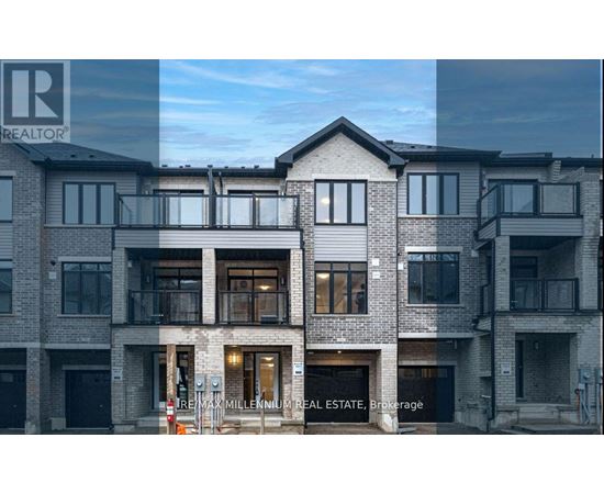 A modern multi-story residential building with balconies and large windows.