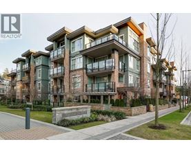 A modern apartment building with balconies and a brick facade.