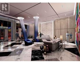 A modern living room with a marble floor and a glass wall.