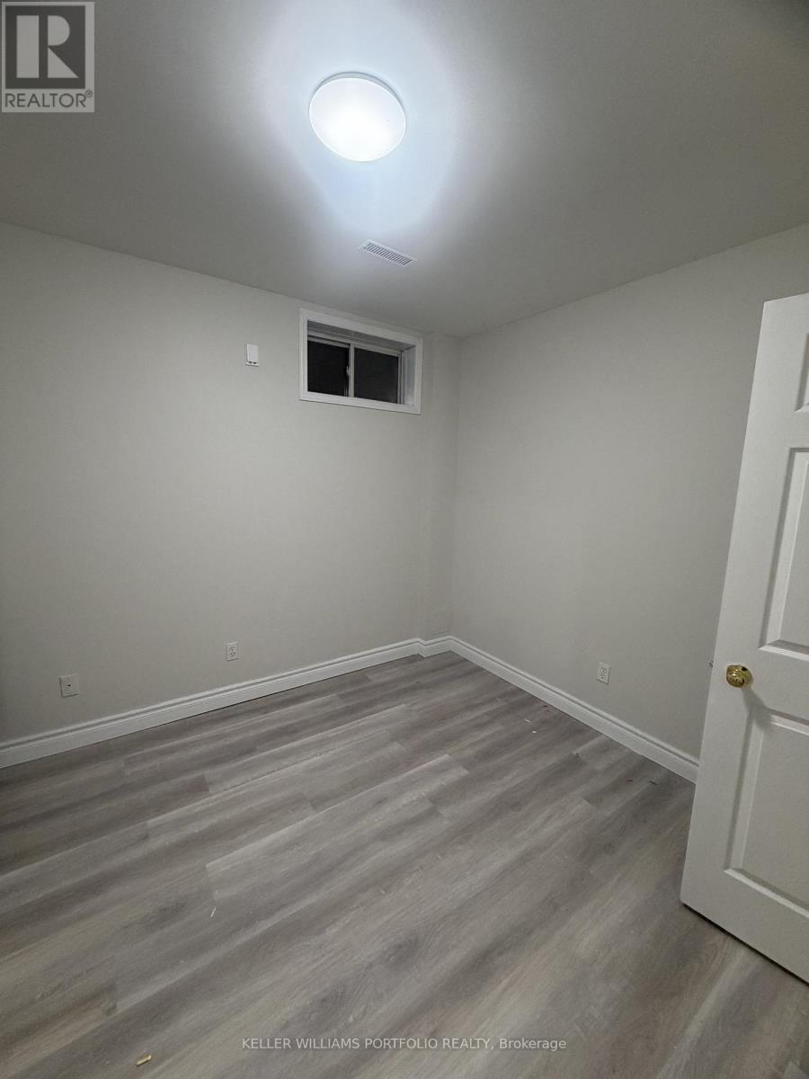 A room with a door and a window.