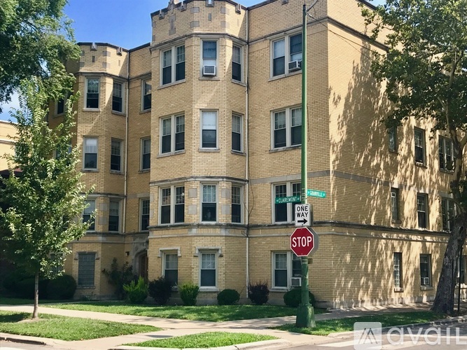 A building with a stop sign in front of it.