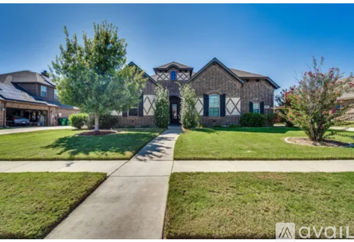 A house with a lawn in front of it is for sale.