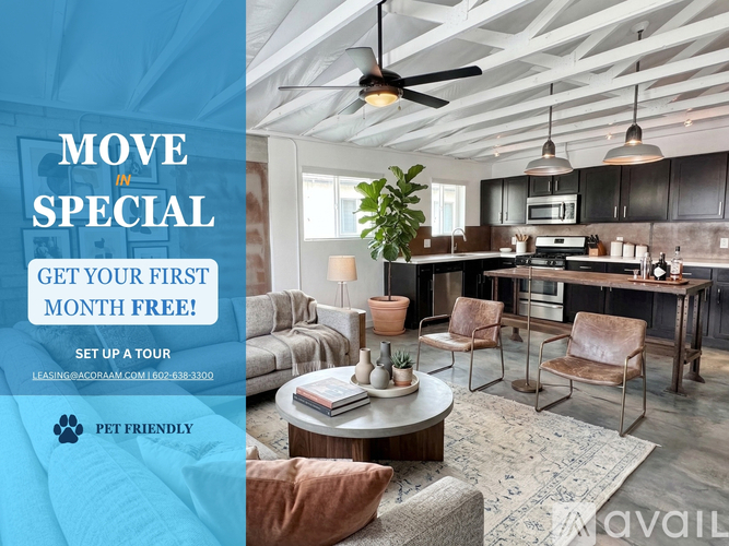 A modern living room with a kitchen in the background and a sign offering a free first month for a move-in special.