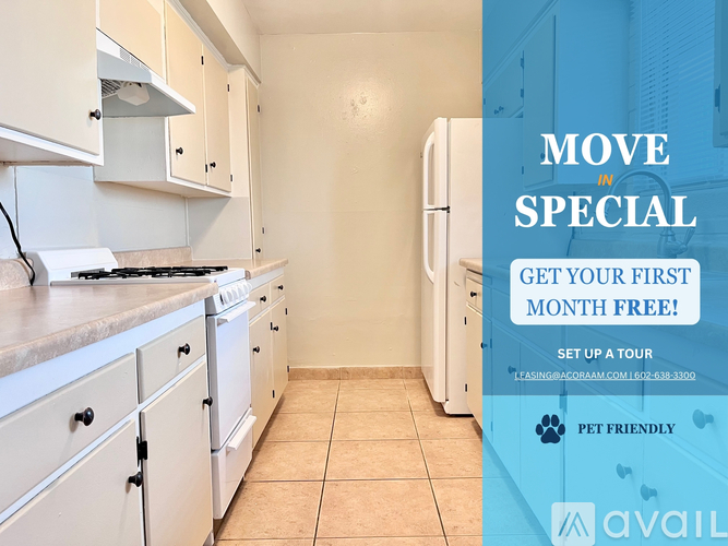 A kitchen with a sign offering a free first month for a move in special.