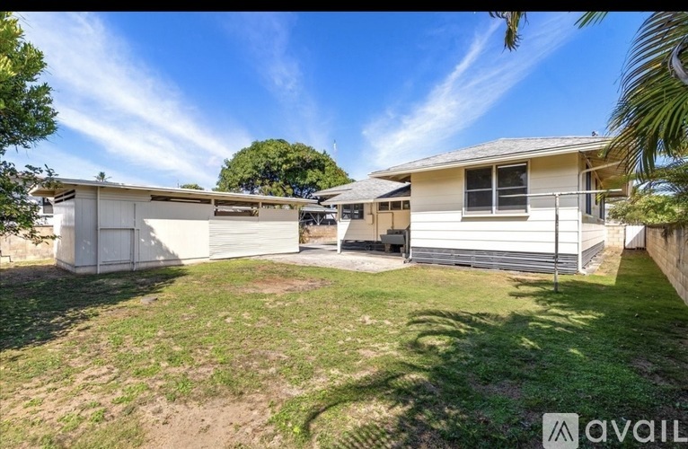 A house with a white garage door is for sale.