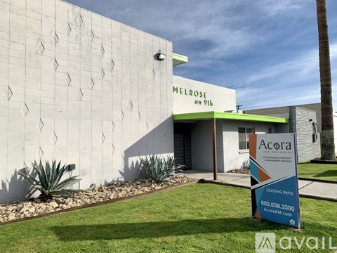 A building with a sign that says Melrose on it.
