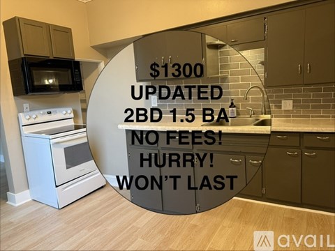 A kitchen with a sign that says $1300 updated 2BD 1.5 BA no fees! Hurry! Won't last.