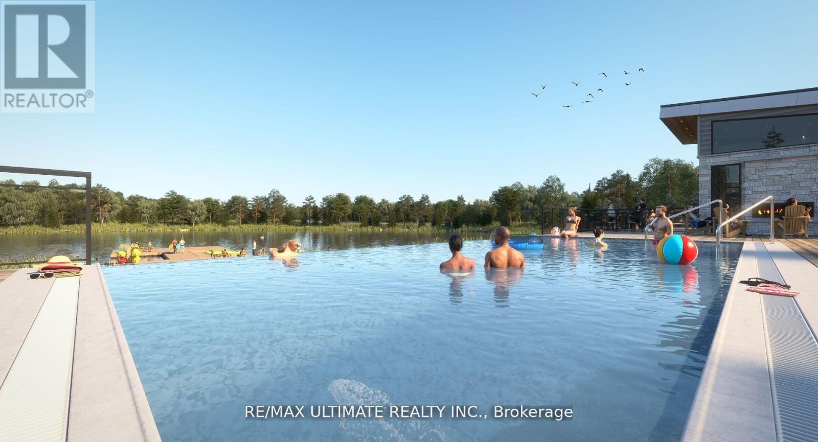 A group of people are enjoying a swim in a pool.
