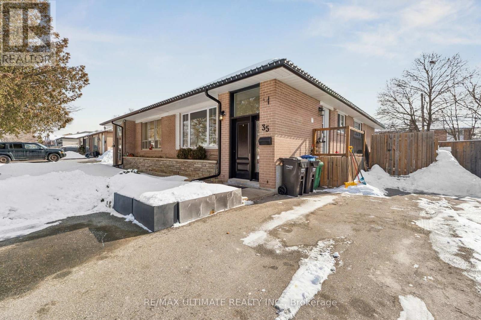 A house numbered 35 is shown with snow on the ground and a car parked in the driveway.