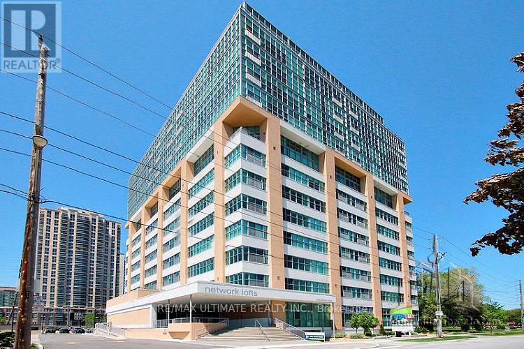 A tall building with the words "network lions" on the front.