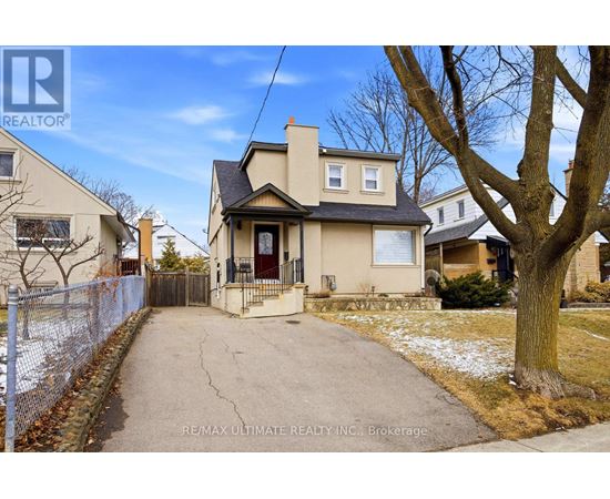 A house with a driveway in front of it.