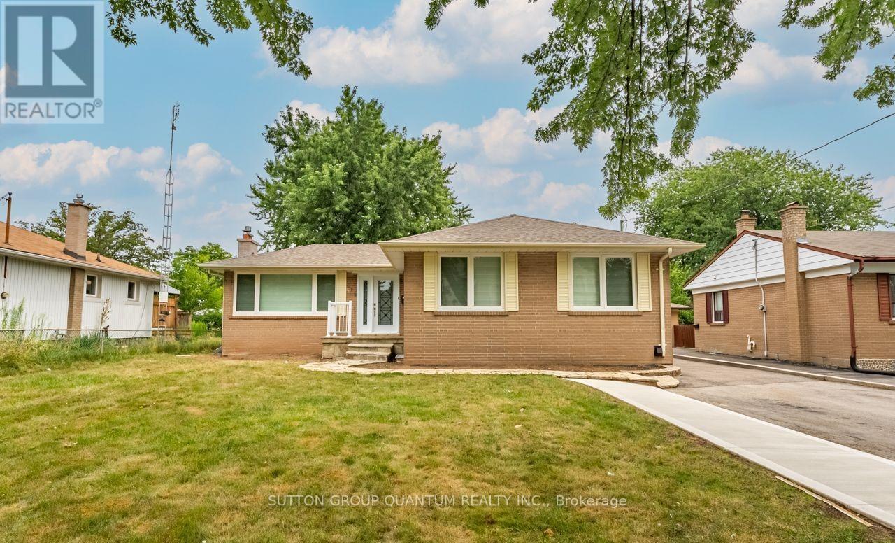 A house with a lawn in front of it is for sale.