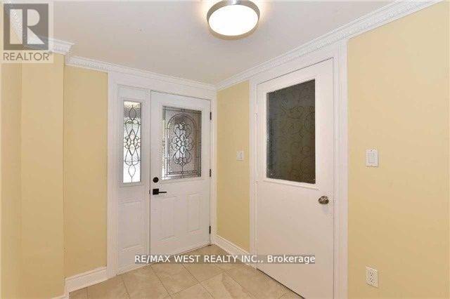 A brokerage office for RE/MAX West Realty Inc.