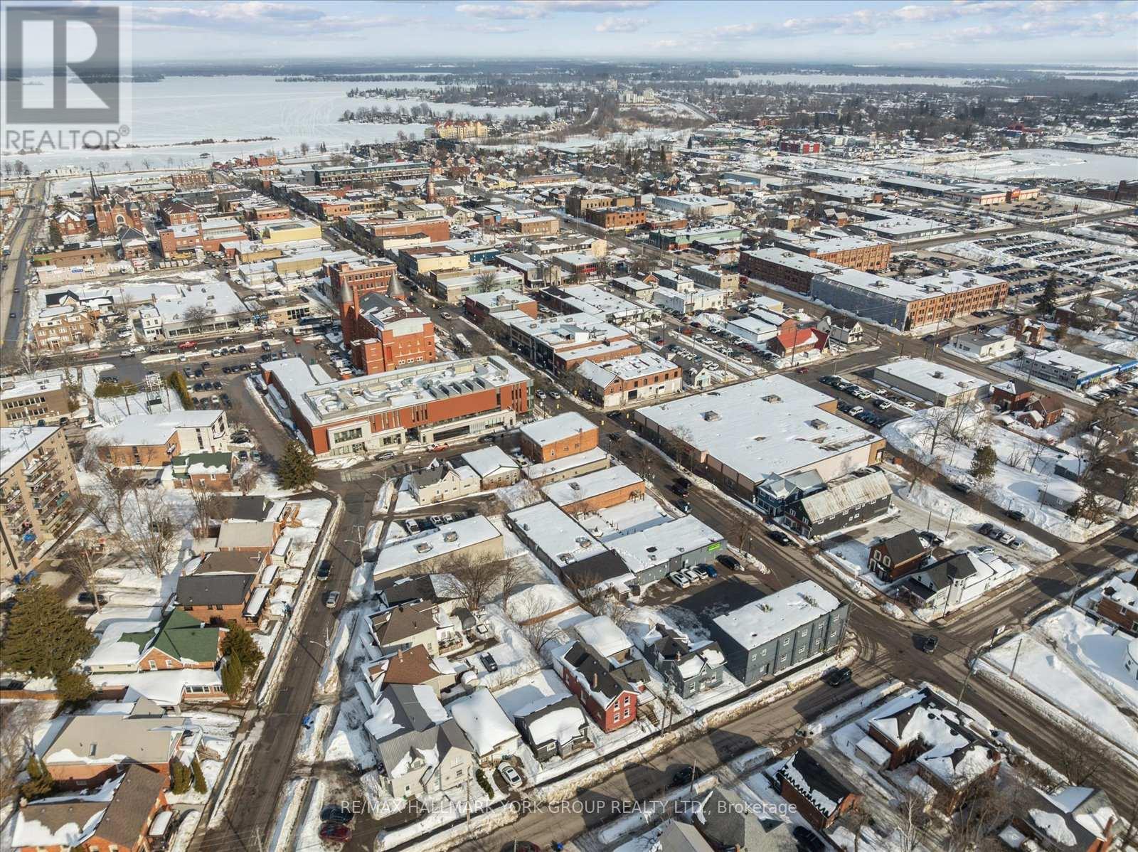 A bird's eye view of a city with buildings and roads.