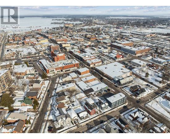 A bird's eye view of a city with buildings and roads.
