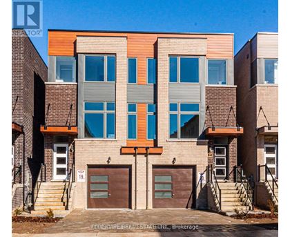 A modern two-story building with a mix of brick and wood paneling.